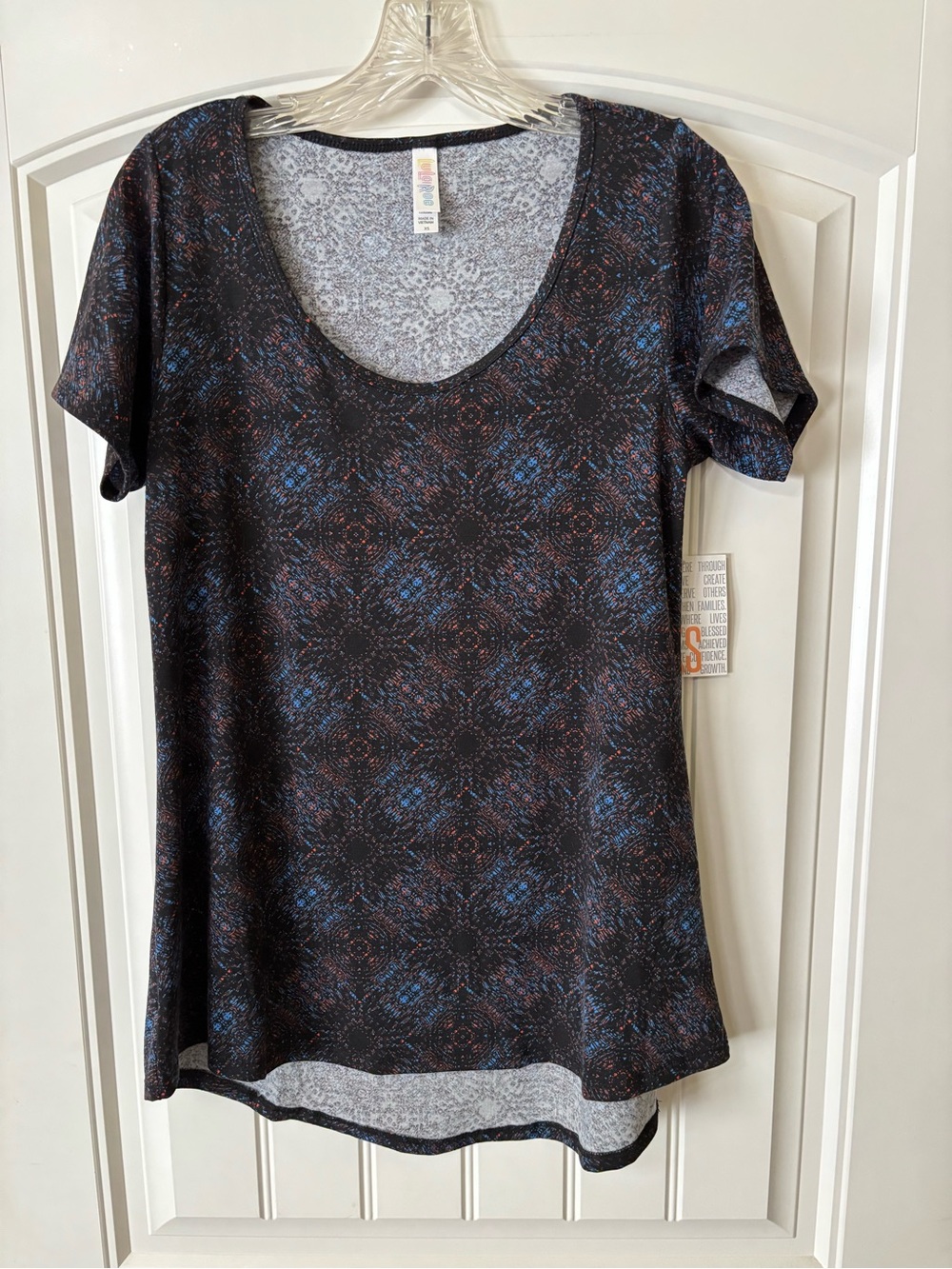 LuLaRoe Black Scoop Neck Short Sleeve Top with Blue and red Pattern